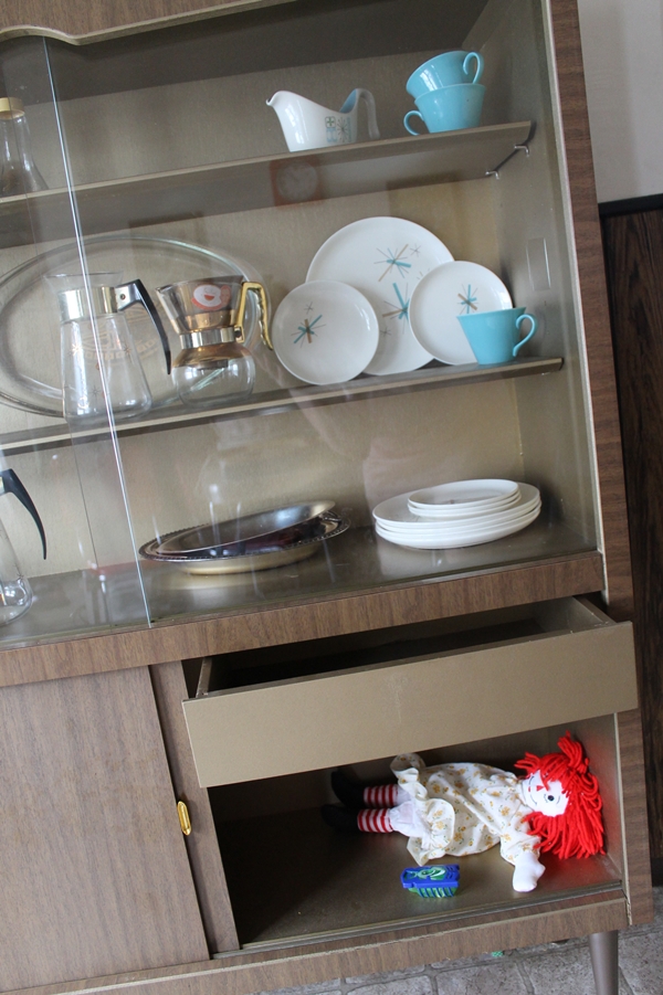 vintage mid century china cabinet with retro china collection
