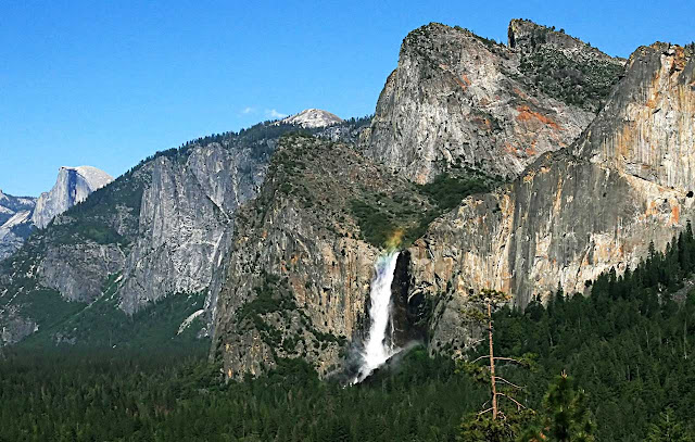 A rainbow over Bridalveil Fall seen from Tunnel View in Yosemite NP