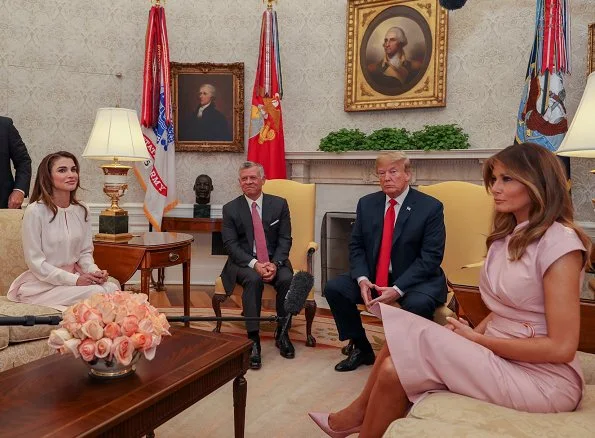 Queen Rania wore a baby pink jumpsuit by Adeam. First Lady Melania Trump wore a pink sleeveless wrap around dress by Proenza Schouler