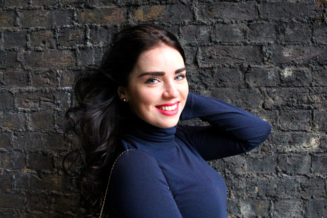Green midi skirt and navy blue polo neck - London fashion blogger Emma Louise Layl