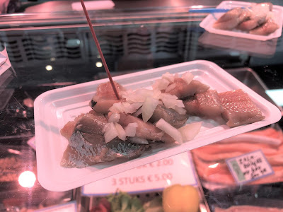 Pickled herring street food in Den Bosch.