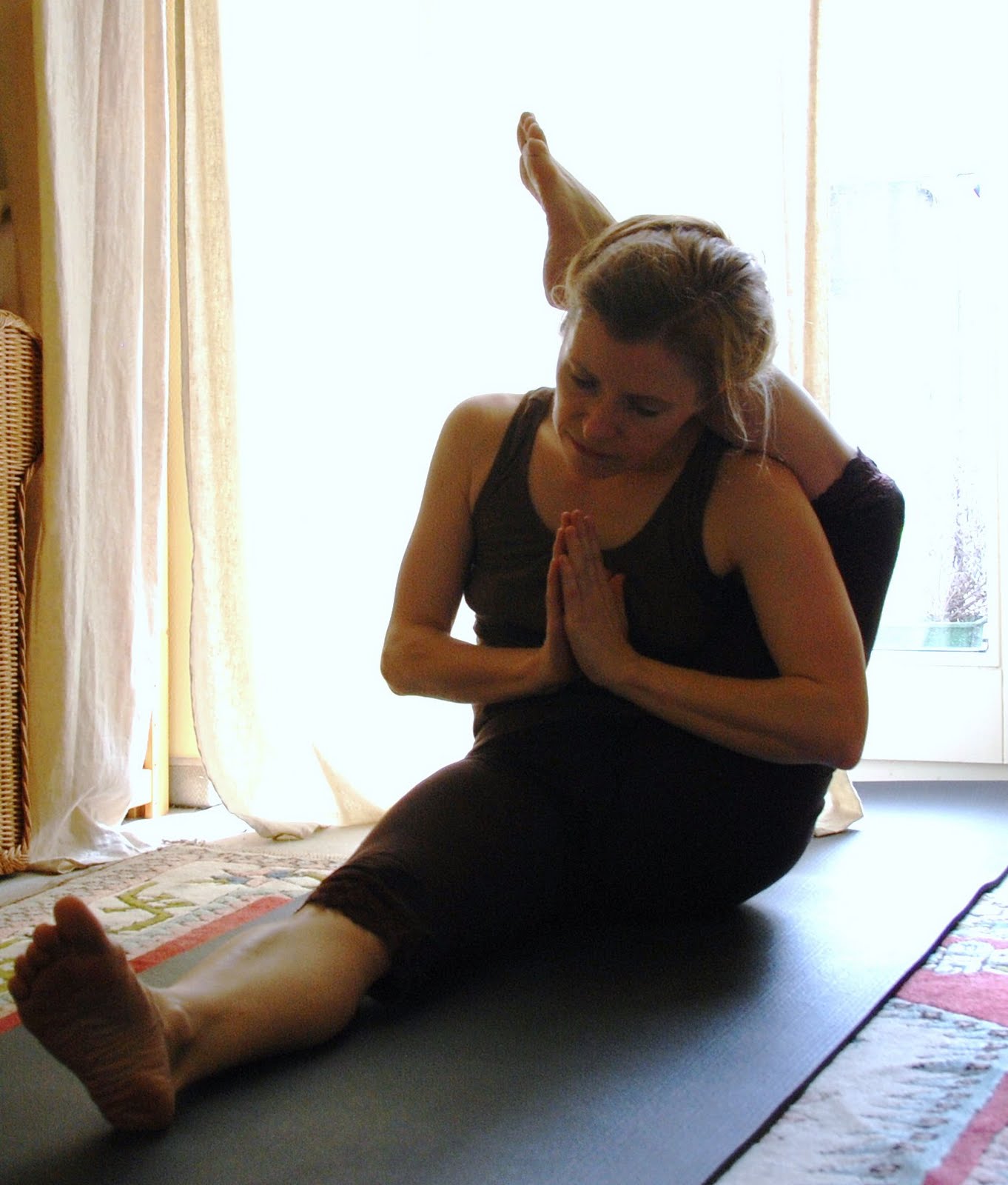 Healthly With Yoga One leg behind the head. Or both?