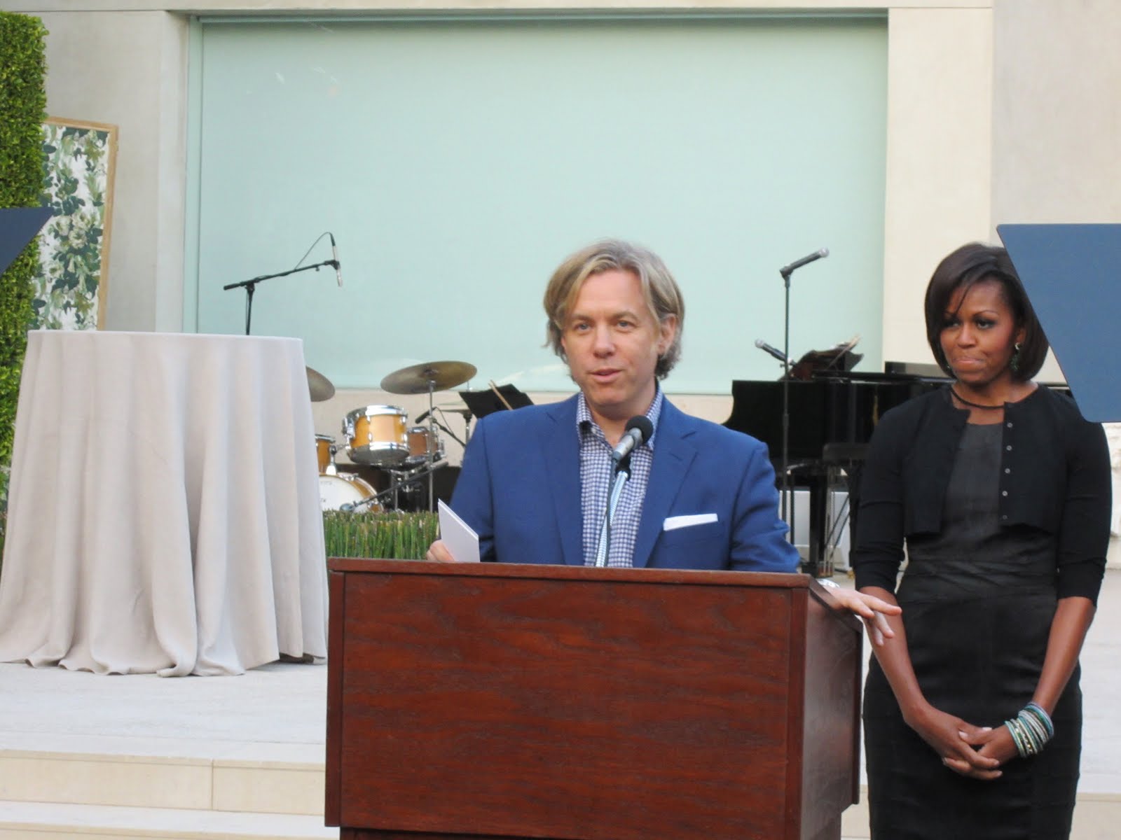 Michael welcomed guests to his home and introduced Mrs. Obama. (above 