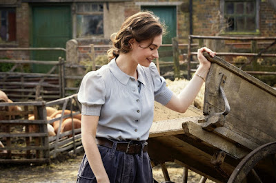 The Guernsey Literary And Potato Peel Pie Society Lily James Image 6