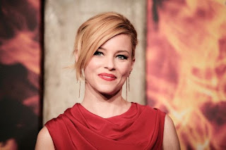 We could get lost in our eyes, despite Elizabeth Banks was hypnotized us in her close and personal dress for Hunger Games premiere. The 40-year-old strolled into the red carpet in a gorgeous red long gown to the event at Berlin, Germany on Tuesday, November 11, 2014! Thanks to her backless region.