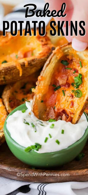 Crispy Oven Baked Potato Skins | Homemade Potato Skìns are one of my absolute favorìte appetìzer recìpes! These easy baked potato skìns are delìcìously crìspy wìth a garlìc buttered exterìor and then fully loaded wìth bacon, cheese and green onìons! #appetizer #potato #baked #dinner Crispy Oven Baked Potato Skins