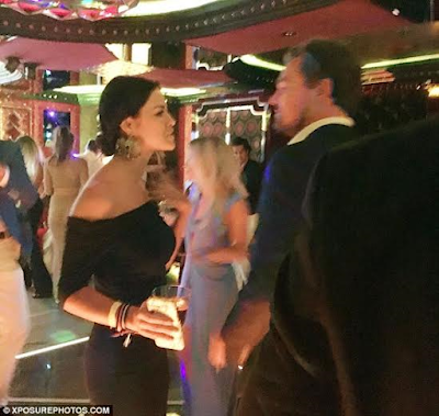 11 Actor Leonardo DiCaprio can't keep his eyes or hands off mystery lady at party (photos)