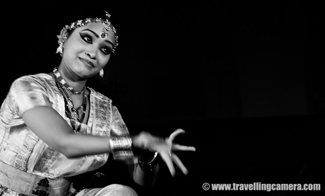 Sattriya Dance Performance during Rongali Bihu Festival @ Indira Gandhi national Center of Arts (organized by Assam Association, Delhi on 24th April 2011) : Posted by VJ SHARMA on www.travellingcamera.com : Sattriya Dance performances is one of the main highlight of Rogali Bihu Festival at IGNCA, Delhi ! And this performance was full of expressions and it seems these songs were telling some story which dancer was enacting through her steps !!!  Let's have a look at some of the photographs from Sattriya performance on 24th April, 2011 with relevant information about this particular form of Indian Classical Dance !!!Sattriya Nritya is one among eight principal classical Indian dance traditions. Whereas some of the other traditions have been revived in the recent past, Sattriya has remained a living tradition since its creation by the Assamese Vaishnav saint Srimanta Sankardeva, in 15th century AssamSankardeva created Sattriya Nritya as an accompaniment to the Ankiya Naat (a form of Assamese one-act plays devisdby him), which were usually performed in the sattras, as Assam's monasteries are called. As the tradition developed and grew within the sattras, the dance form came to be called Sattriya Nritya.The name 'Sattriya' has been derived from the word 'Sattra' which are religious Institutes set up by the Vishnava Saint Shrimanta Shankardev for preserving and propagation of tradition, culture and religion. It was coined centuries after and represents all that the Saint had created, which brought about a Socio-cultural Renaissance in the Assam Valley of INDIA !!!The Sattra style was evolved when Shankaradeva, a great artist and musician in himself composed 'Ankiya Bhaona' or 'Ankiya-Nat' (dance-dramas), devotional music- 'Borgeet', and the four sacred texts - “Kirtan', 'Dasam' 'Ghosa', 'Ratnavali' (the last two composed by Madhavdev). A School of Philosophical Learning emerged and a deeper understanding of life through the simple path of devotion brought one and all to the fold...Actually Sattriya dance of Assam is aclassical form of dance which is highly devotional in character with the spiritual aspect being predominant all through !!!This Dance form of Sattriya is like many of the other Classical Dance forms of India which has been extracted from a larger body of theatrical practices that constitute the Ankiya Bhaona form. References of this dance form can be found in the ancient Indian classical texts like the Natyashastra, the Kalikapurana, the Yoginitantra, and the Abhinayadarpana apart from many sculptures, and historical relicsThe musical Instruments that accompany a performance are the khols or the drums, the taals or the cymbals, the flute and the violin. Even though Sattriya dance is performed by bhokots or the male monks traditionally in monasteries...The popular forms of the Sattriya dance are Apsara Nritya, Behar Nritya, Chali Nritya, Dasavatara Nritya, Gosai Prabesh,  Nadu Bhangi, Manchok Nritya, Bar prabesha, Gopi Pravesha, Rasa Nritya, Rajaghariya Chali Nritya, and Sutradhara.While I was searching throuh all relevant information about this particular form of Indian Classical dance, I found a link where I saw the same artis.. Please have a look and she really looks the same. Isn't it? - http://www.mridusattriya.com/satt_dance.htmlThe Sattriya dance can be classified into two styles namely Paurashik Bhangi that is Tandav or masculine style and Shtri bhangi which is Lasya or feminine style !!!This was one of the interesting performance of the evening at Rogali Bihu Festival although colorful lighting spoiled my lot of photographs... I will be sharing some colorful shots of Sattriya Dance soon !!!Now I know another Indian Classical Dance form and loved the expressions of performer here !!!