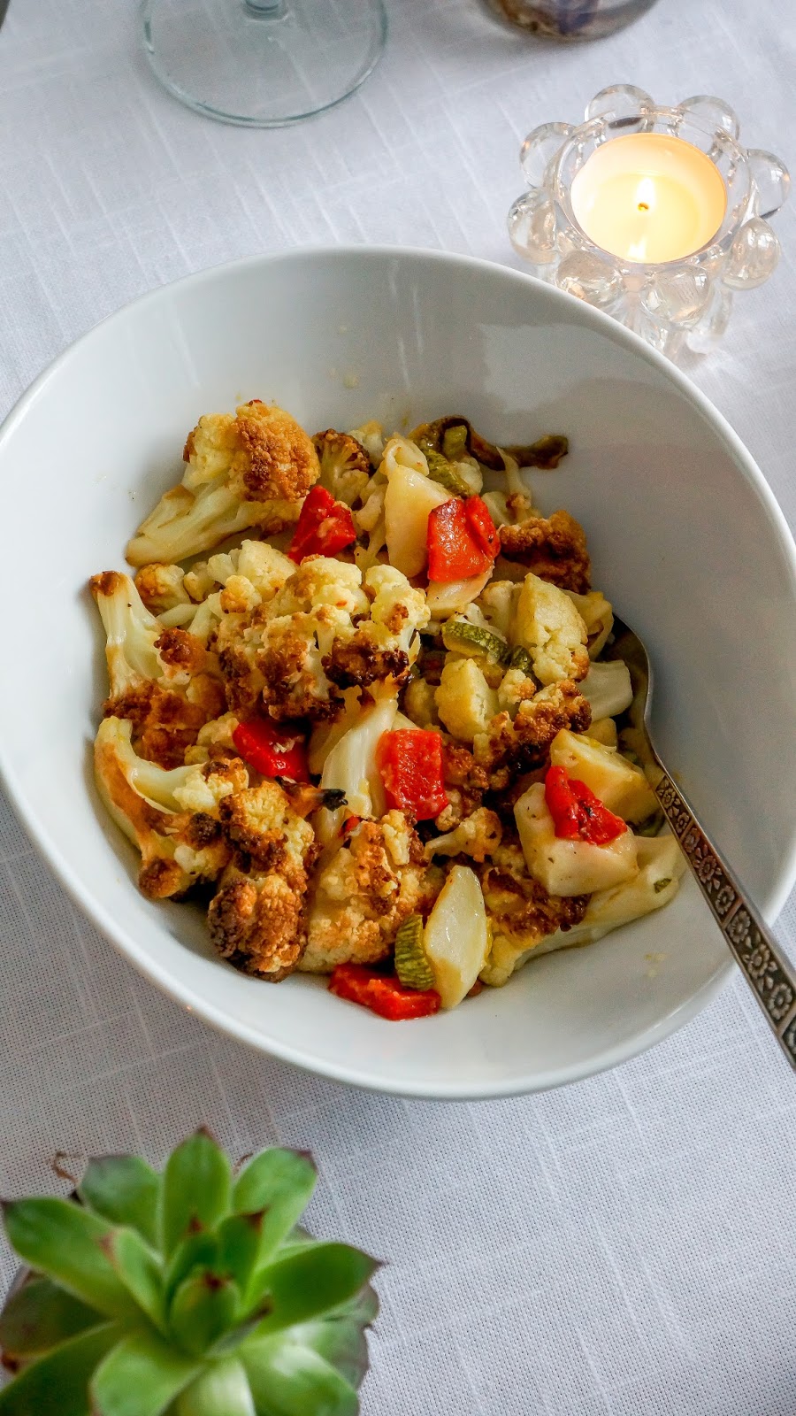 Roasted cauliflower, zucchini and red pepper salad
