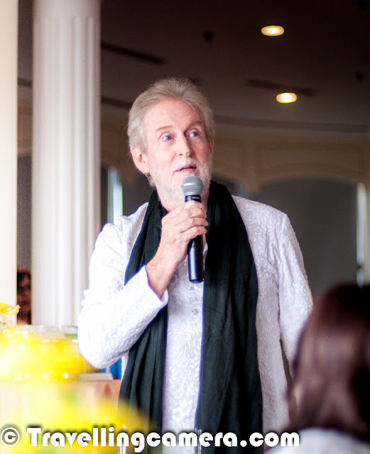 It was a beautiful evening when Tom Alter was presenting great poerty at Le Meridien, New Delhi. Travellingcamera team was also invited. This Photo Journey shares some moments from the same evening. We also shot some videos which are yet to be processed & shared. So let's enjoy these photographs and share your feedback/suggestions.Which version do you like ? The Black & White one or colored version? Above photograph shows two of my favorite people from the evening - Tom Alter & Shreen, both are awesome poets ! Above photograph shows the moment when Shreen asked him to guess her name. Actually she has done a play with Tom Alter and she gave different hints to guess the name & recall about their last meeting. I loved this interaction.This was first time I was seeing Tom Alter live in front of me. Three years back, I went to Alliance Francaise to watch Mirza Galib but cast was different, so missed seeing him.Tom Alter was here with the Tea Expert Anamika Singh/ With amazing poetry by Tom Alter, we had amazing Anandini Tea at Le Meridien, Delhi.Tom had a fabulous entry into the hall where everyone was waiting eagerly to see him & listen to his poetry. He also presented poems written by other famous poets !!His poems were quite apt for the whole environment and theme of the evening !Tom Alter is native of Mussoorie and the son of American Christian missionaries of English and Scottish ancestry and has lived for years in Mumbai and the Himalayan hill station of Landour. His father was born in Sialkot, now in Pakistan. His elder sister Martha Chen has a PhD in Sanskrit and his brother John is a poet and a teacher. He studied at the Film and Television Institute of India. His major inspiration to enter films was Rajesh Khanna.During the evening he presented different poems along with appropriate songs. It was quite apt from his impressions that he quite enjoys poems & music. His presence really changes the whole environment of the hall full of media, Bloggers & tea lovers etc.Check out more about Tom Alter @ http://en.wikipedia.org/wiki/Tom_Alter