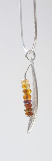 pendentif plume tourmaline jaune et argent Sb au féminin pendentif plume
