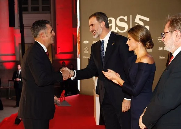 King Felipe. Queen Letizia wore DELPOZO flower embellished long-sleeved dress at As Sports Awards