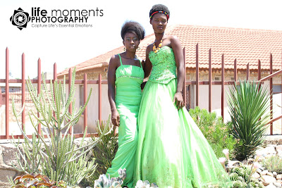 Life Moments Photography. Venencia Mangwende and Hope Muzunze wear green gowns. 