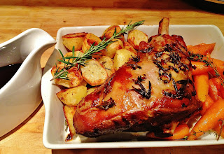 Slow Roasted Leg of Lamb with Roast Potatoes in Rosemary & Garlic, Glazed Carrots & Leek Gratin 