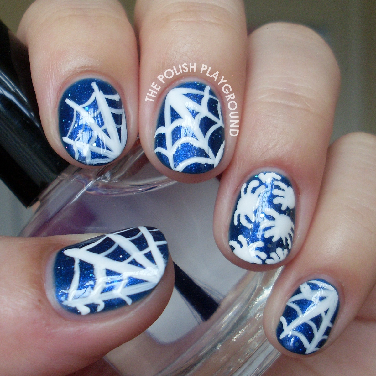 Halloween Inspired Spiders and Cobwebs Nail Art