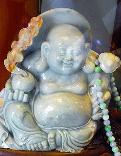 a beautiful carved jade white Buddha a beautiful carved jade white Buddha