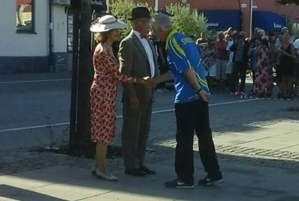 King Carl XVI Gustaf and Queen Silvia of Sweden took part in the King's Rally on the island of Öland. floral print summer dress