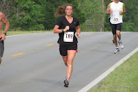 #189 Brittny Johnson (17th, 21:02) 300 meters before she crossed the finish line with a victory in the Hot Trot 5K women's division. Brittny Johnson