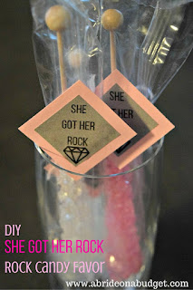 Want a tasty (and easy) bridal shower or engagement party favor? Make our DIY "She Got Her Rock" Rock Candy Favor from www.abrideonabudget.com. Even better, there's a free printable for the tags in the post too!