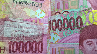 Logo Palu Arit Di Uang Kertas Pecahan 100 Ribu Rupiah