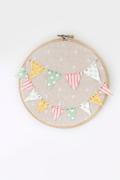 this embroidery hoop art project would be perfect decoration for a nursery or child's room