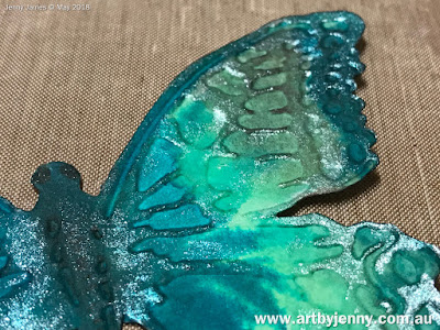 butterflies art journal page using stamps and other mixed media craft supplies