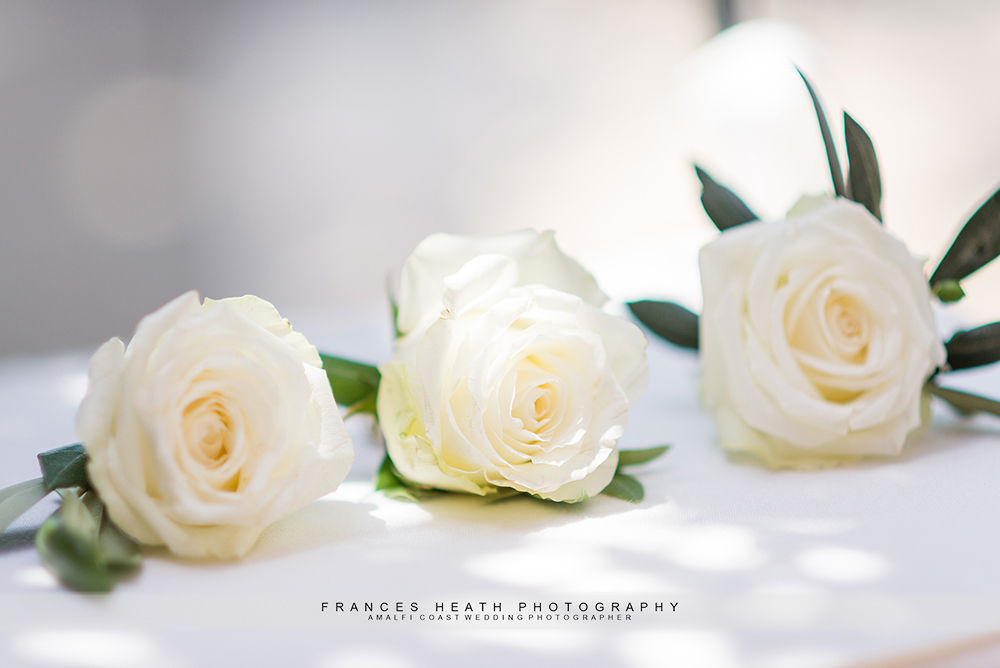 Boutonniere white roses with olive branch