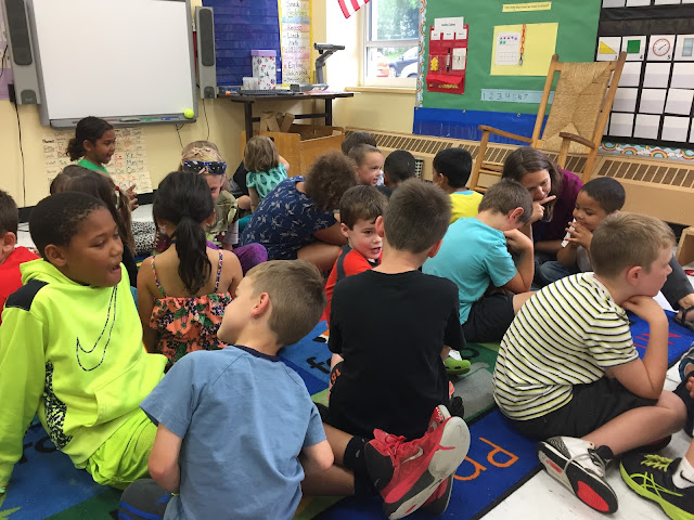 third graders talking with K buddies