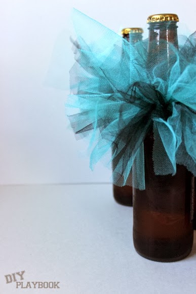 Bachelorette Beer Bottles - Use little pieces of tulle to DIY this beer decoration!