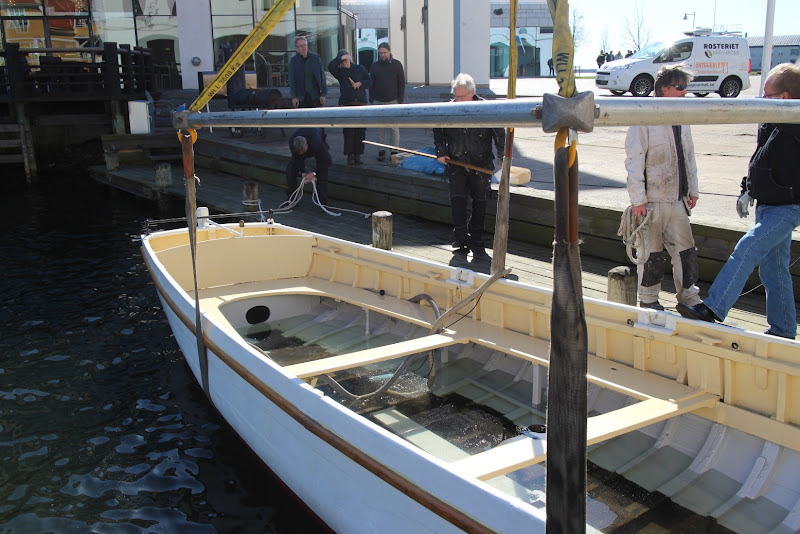 Fixing a leak on my wood boat while it is still in the water.
