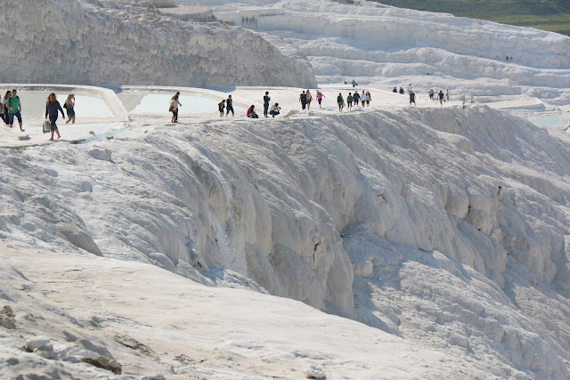 The nature wonder of Pamukkale Thermal Pools or also known as Travertines Terraces which attracts many tourists to Pamukkale in Turkey The nature wonder of Pamukkale Thermal Pools or also known as Travertines Terraces which attracts many tourists to Pamukkale in Turkey