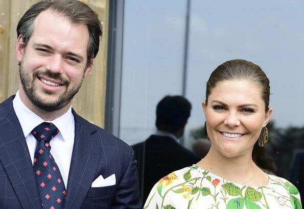 Crown Princess Victoria wore Rodebjer irmaline floral print top and skirt. Caroline Svedbom gold earrings. Prince Felix of Luxembourg