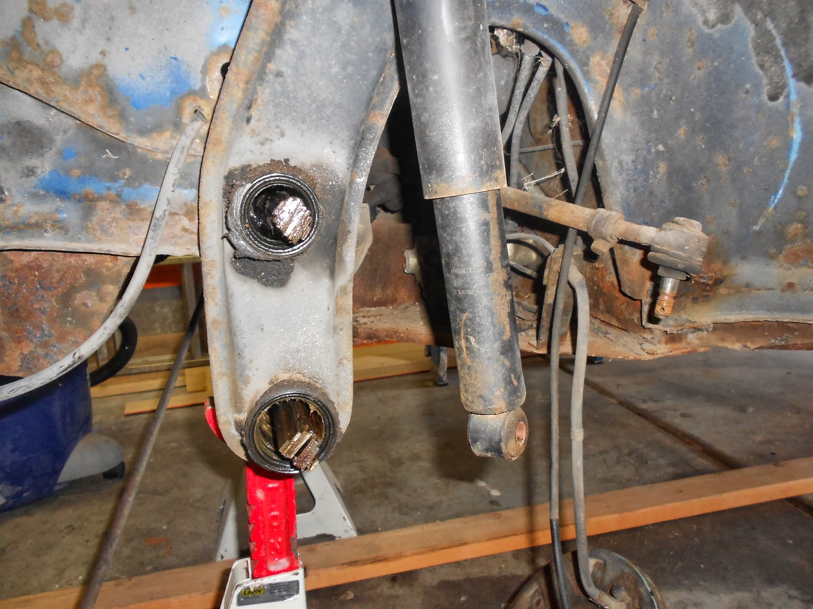 The Bug Boys Installing ball joints and raised spindles in the bug.