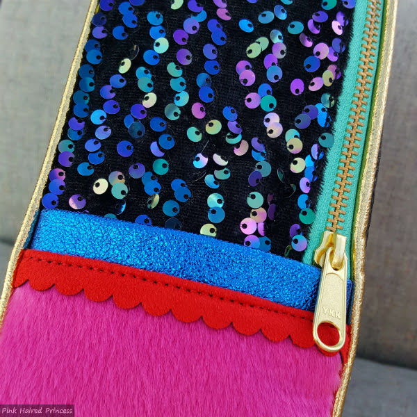 Irregular Choice Bon Anniversaire handbag side pink fur, blue metallic and multi coloured sequins sides of handbag