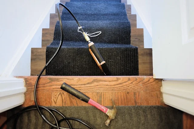 attaching a new carpet stair runner to finished tiles