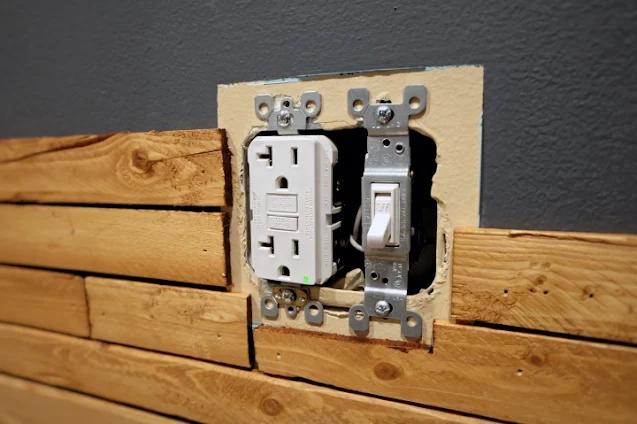 wood lath around wall electrical outlet