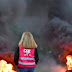 French truckers block motorways, fuel depots