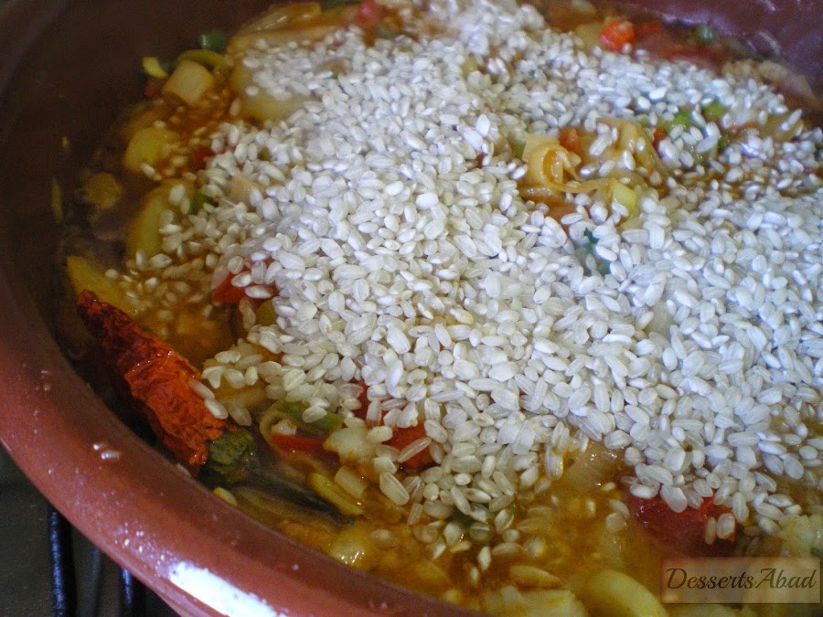 Arroz con bacalao y langostinos (Añadido de arroz)