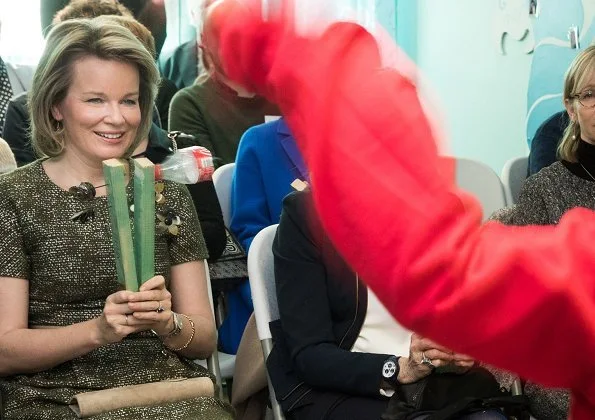 Queen Mathilde of Belgium visited the Fernand Philippe Maternal Home in Wanfercée-Baulet. The Queen wore Natan green dress