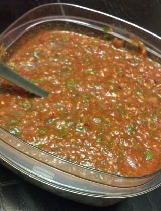 This authentic salsa recipe will make your next large gathering a hit and leave people wanting more. Whether throwing a party or simply making some salsa for your own enjoyment, this recipe combines the perfect blend of spices and herbs for a wonderful eating experience. The versasility of this salsa is amazing! Try it on chips, eggs, grilled chicken or steak! This recipe is so simple, you dont need to roast peppers or cook the onion, throw it all in the blender and serve