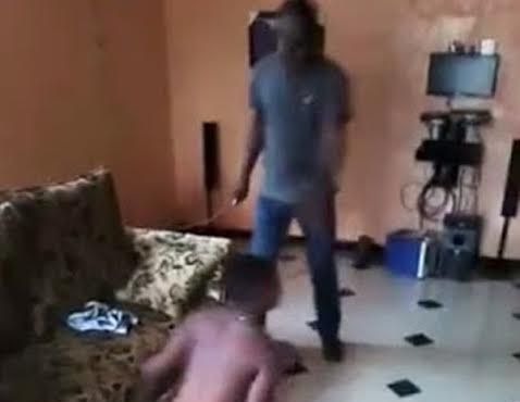 1 Shocking video shows angry father beating teenage daughter in Ebonyi State after he caught her having sex with lover