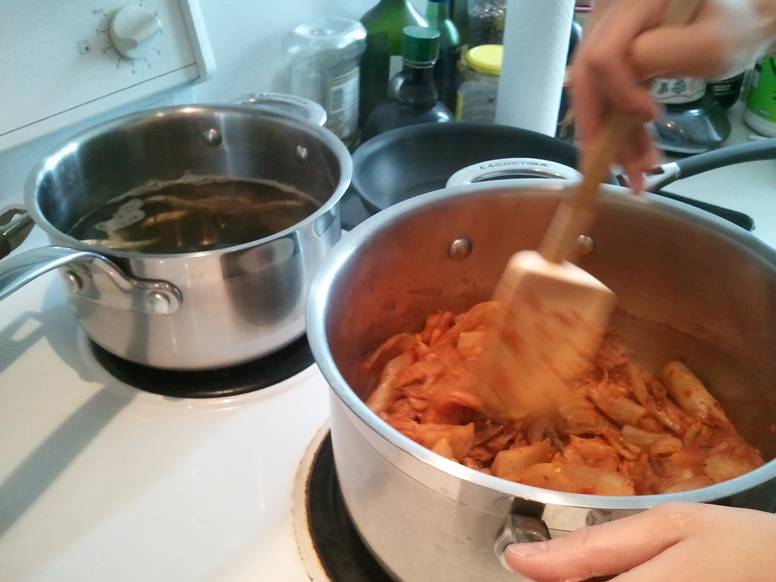 three purple plates kimchi chigae (spicy kimchi stew)