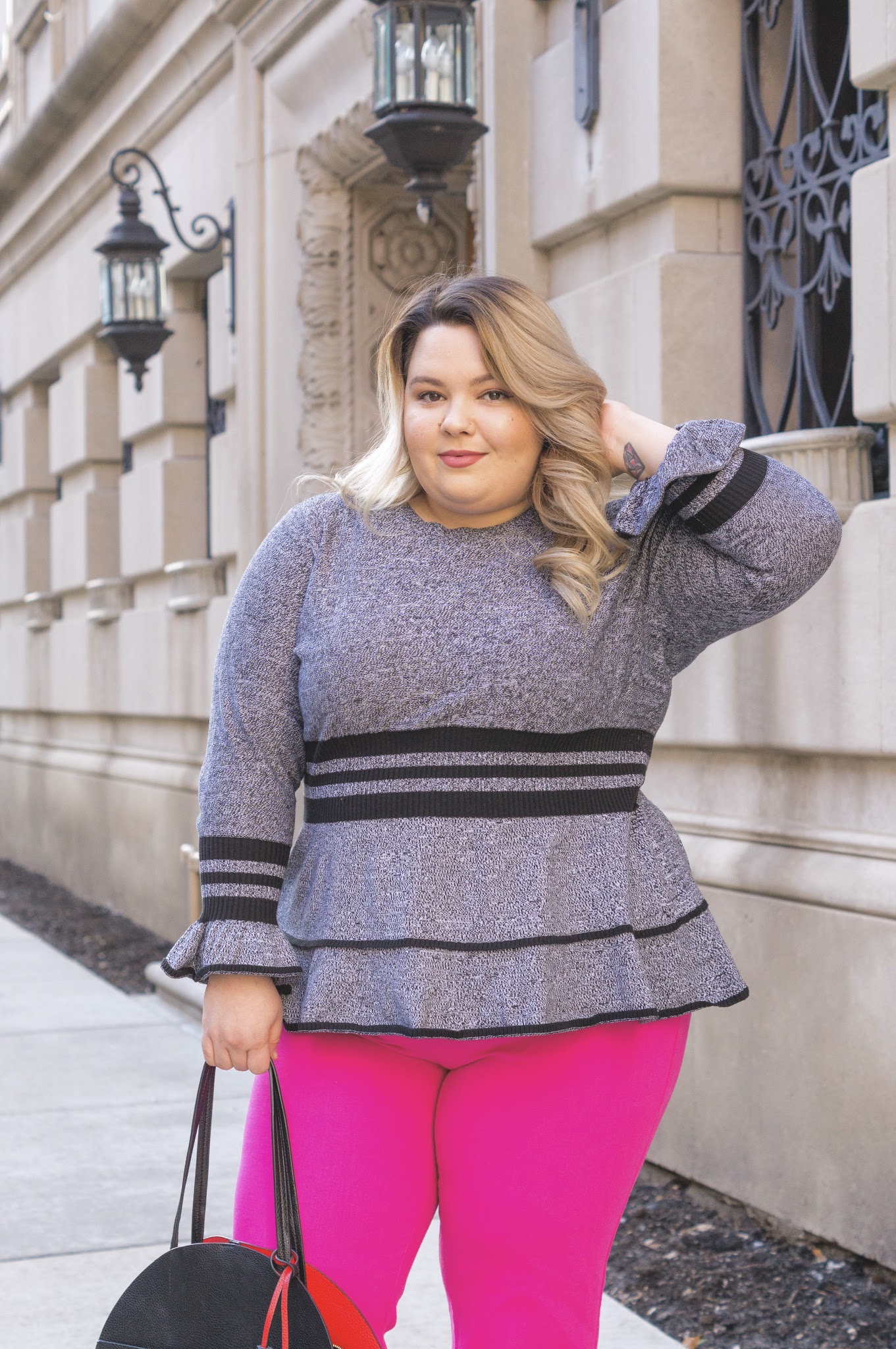 Chicago Plus Size Fashion Blogger Natalie in the City reviews Eloquii's sweaters and the Victoria Beckham for Target Fuscia Twill Flared Trousers.