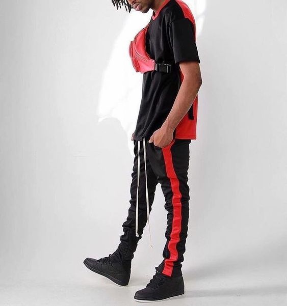 calça preta com listra vermelha masculina