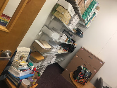 the storage shelves in the office on their way to being konmaried
