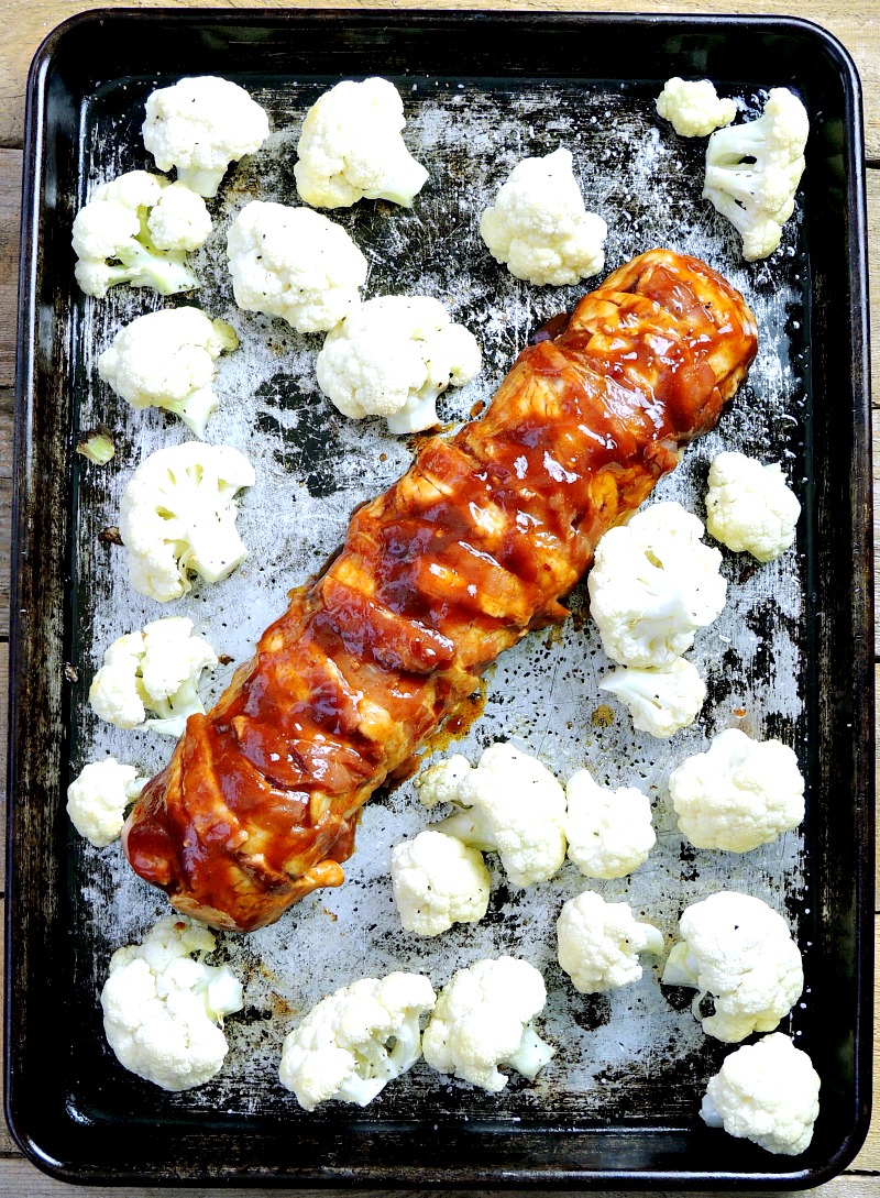 This Keto Sheet Pan Bacon Wrapped BBQ Pork Tenderloin recipe is the easiest way to get that BBQ flavor without having to light the grill, this sheet pan meal is so easy and perfect for a busy weeknight meal. #keto #lowcarb #lchf #sheetpan #pork #tenderloin #bacon #easy #recipe #glutenfree #kidfriendly | bobbiskozykitchen.com