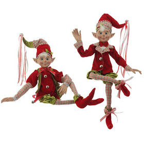Christmas elf in red, green, and white houndstooth costume