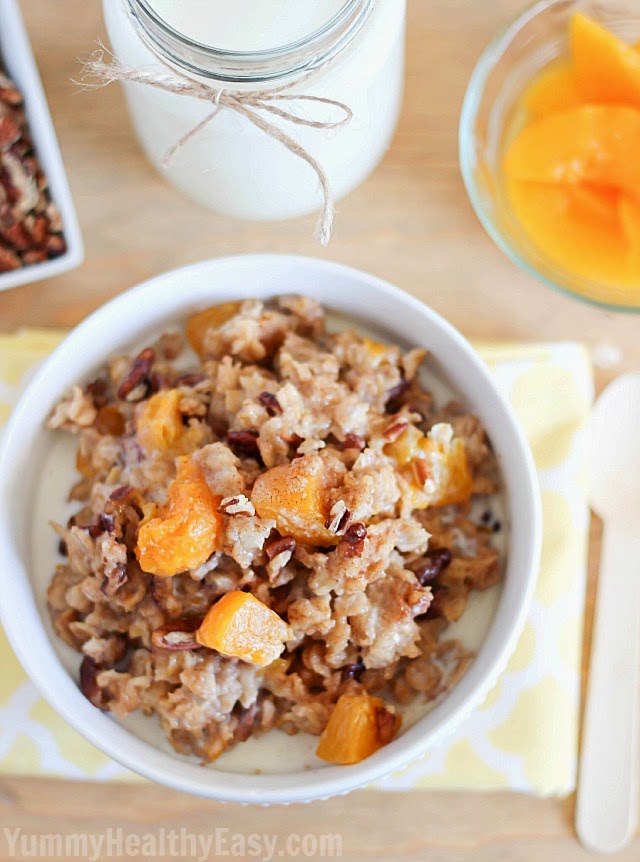 Start the day off with a healthy and EASY breakfast with this Slow Cooker Peach Oatmeal! AD