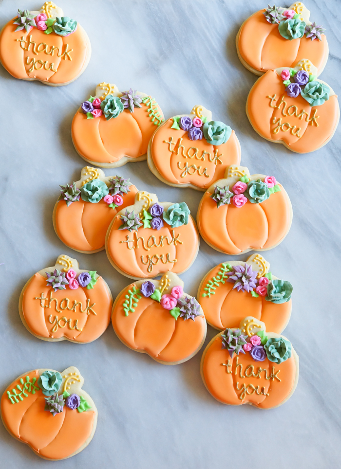 decorated pumpkin cookies with royal icing succulents and roses | bakeat350.net