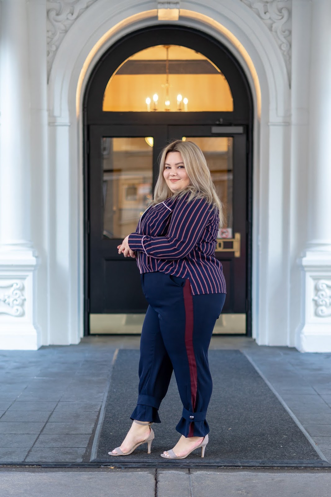 Chicago Plus Size Petite Fashion Blogger and model Natalie Craig reviews Soncy's, a new plus size boutique, Suit Up High Waisted Tuxedo Trousers and the Let's Hit Snooze Striped Top.